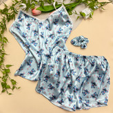 ست 3 تیکه تاپ شورتک زنانه به همراه کش مو طرح استیچ جنس ساتن | free size